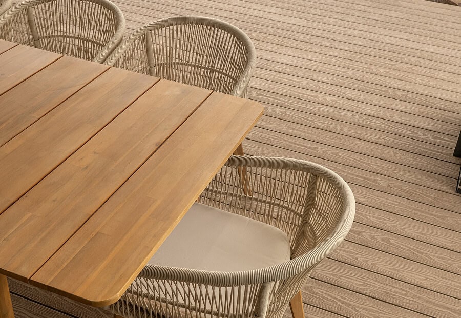 Diagram showing Nature Cool technology on timber decking with sun rays reflecting to reduce heat.